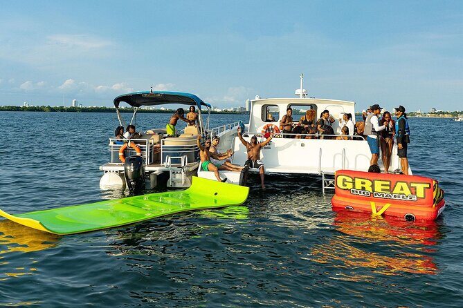3 Hour Party Boat Jet ski Banana Tube and open bar in Miami - The Cruise Stops: Getting the Famous Views Without Planning a Full Day